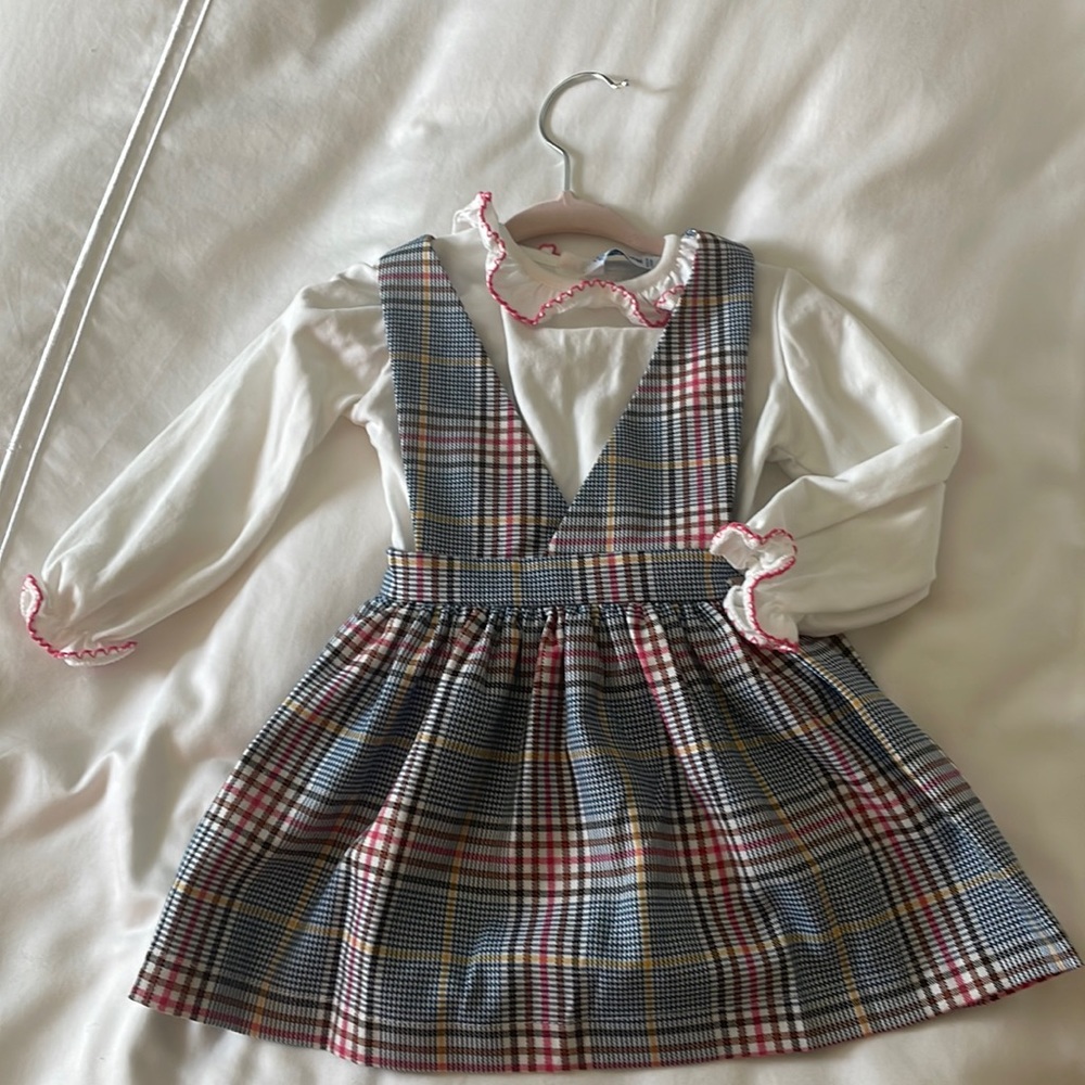 Mayoral plaid jumper dress and white long sleeve shirt with pink ruffle